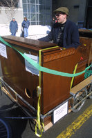 Hammond organ being played on a bike trailer